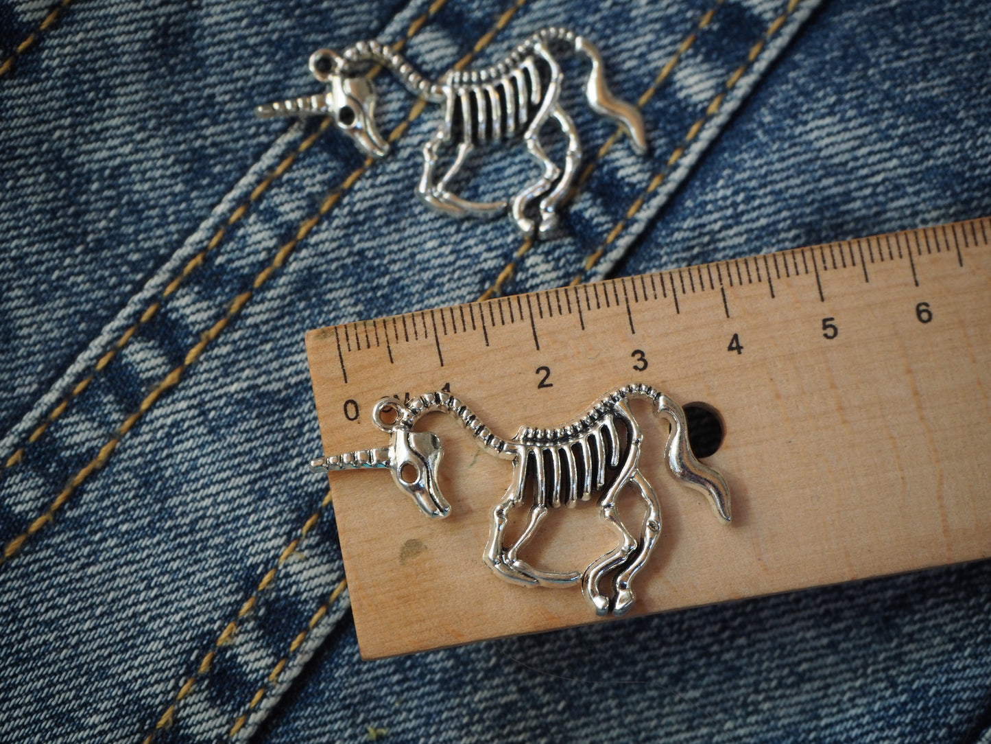 Unicorn Skeleton Metal Pendant