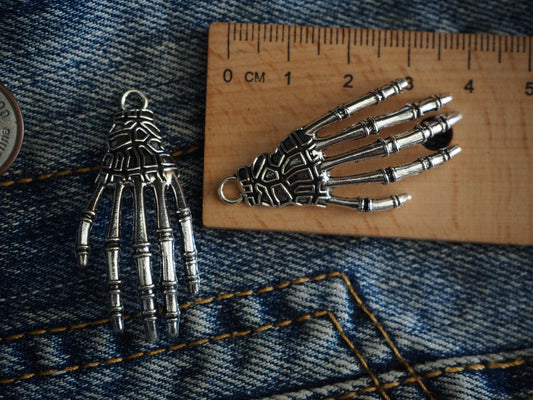 Hand Of The Dead Metal Pendant