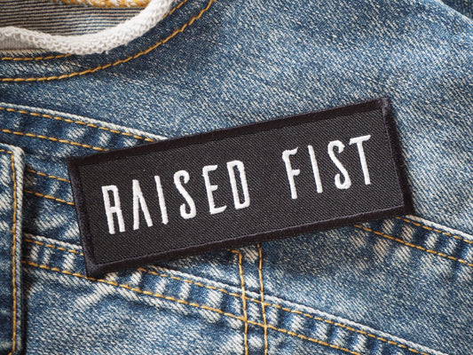 RAlSED FlST Patch