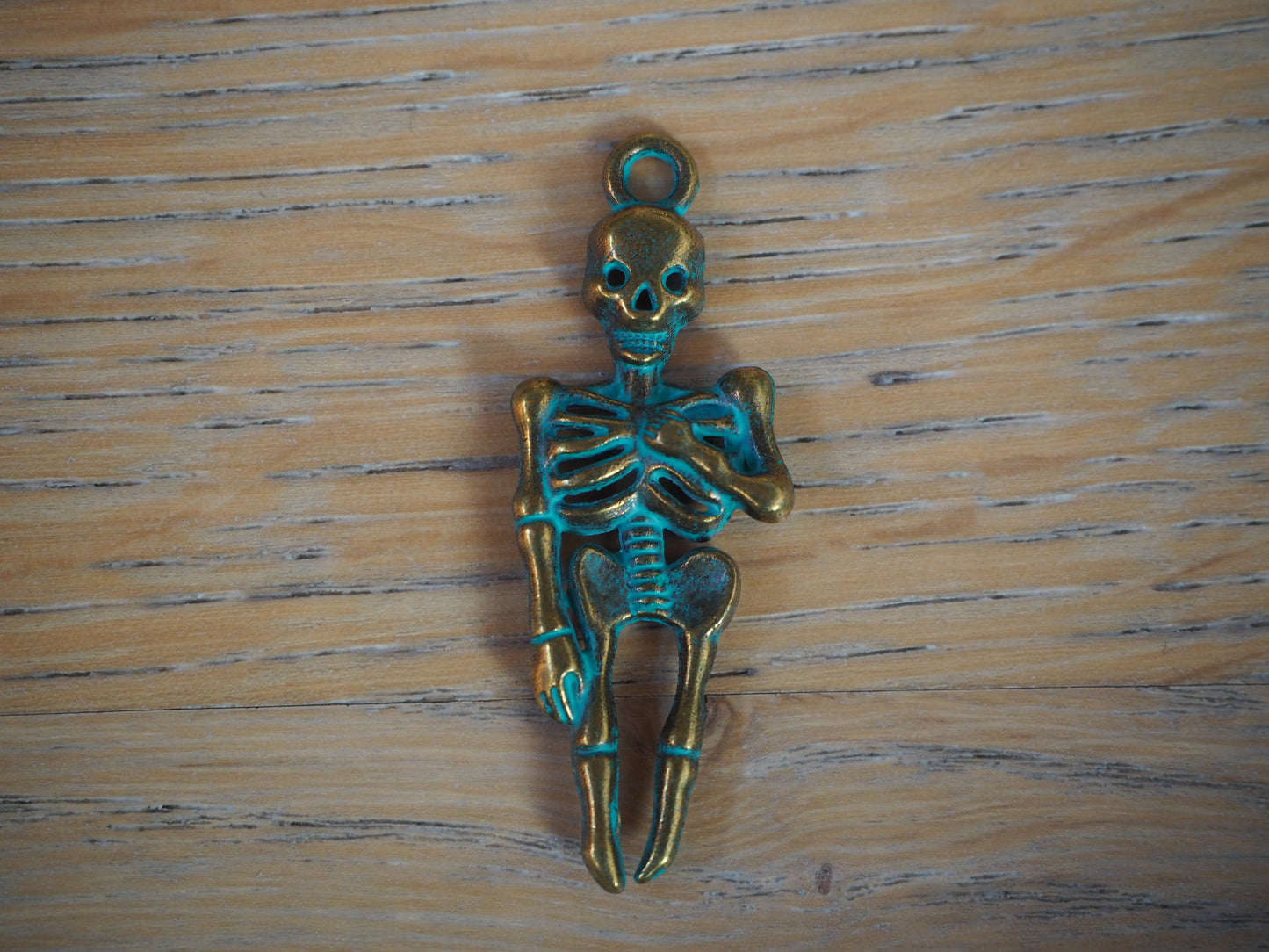 Skeleton metal pendant