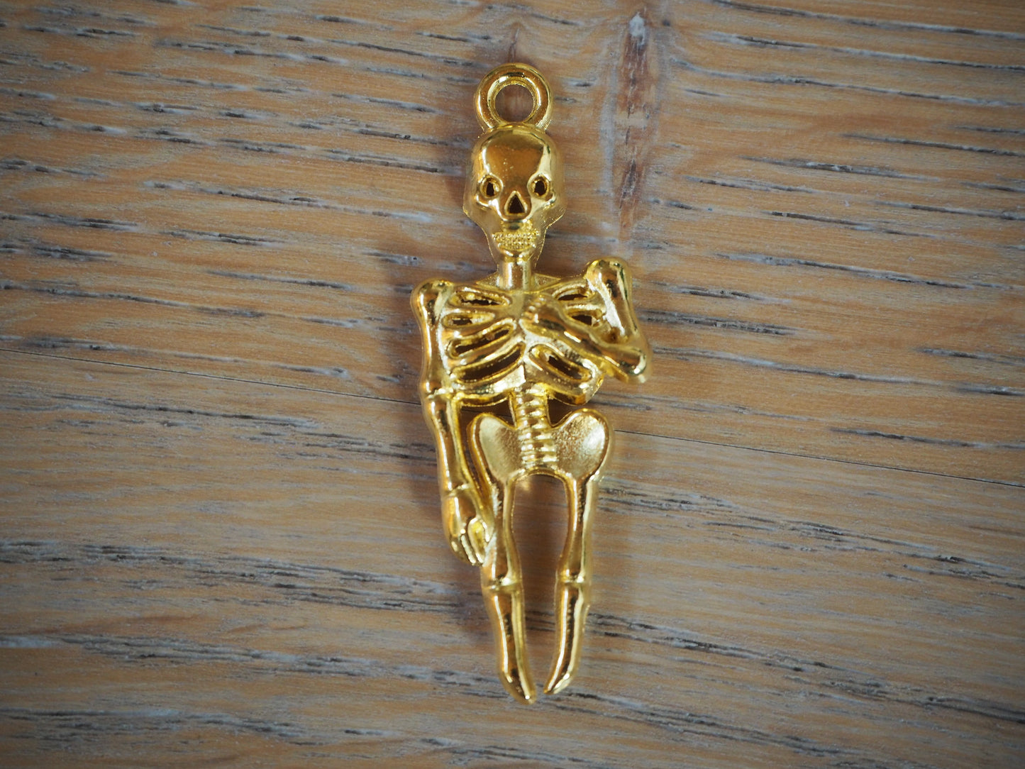 Skeleton metal pendant