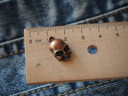 Skull metal pendant